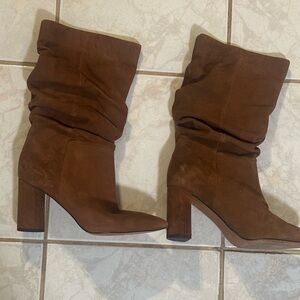 Slouchy boots. Put them few times. Very good condition.